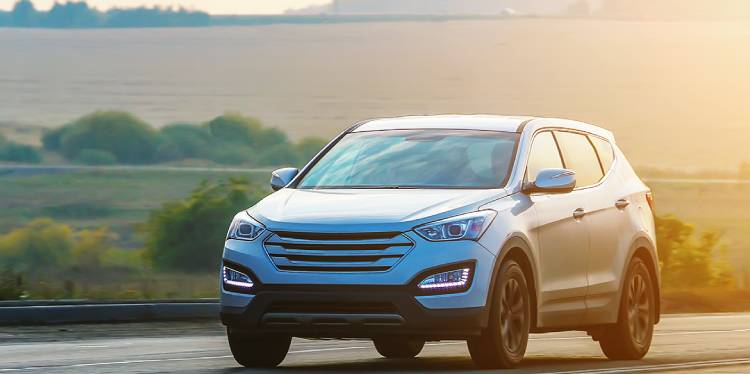 Image of red car freshley insured by affordable Auto insurance Agency in Bartlett, TN