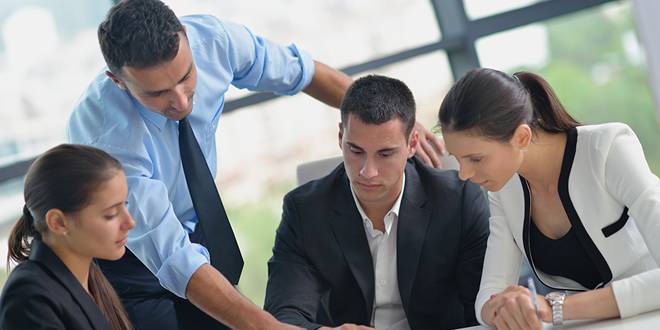 Image of man in a suit looking smug with the knowledge of having the best Business Insurance from Kellon Insurance located in Bartlett TN